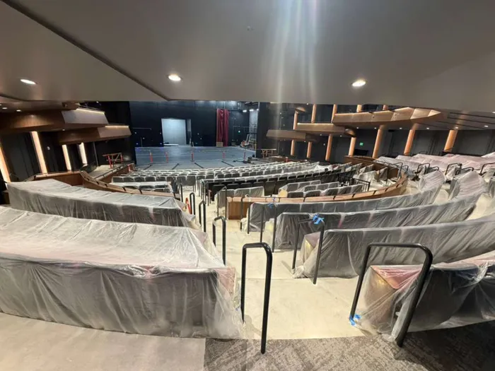 Tiered balcony seating in the main theater, protected during final cleanup